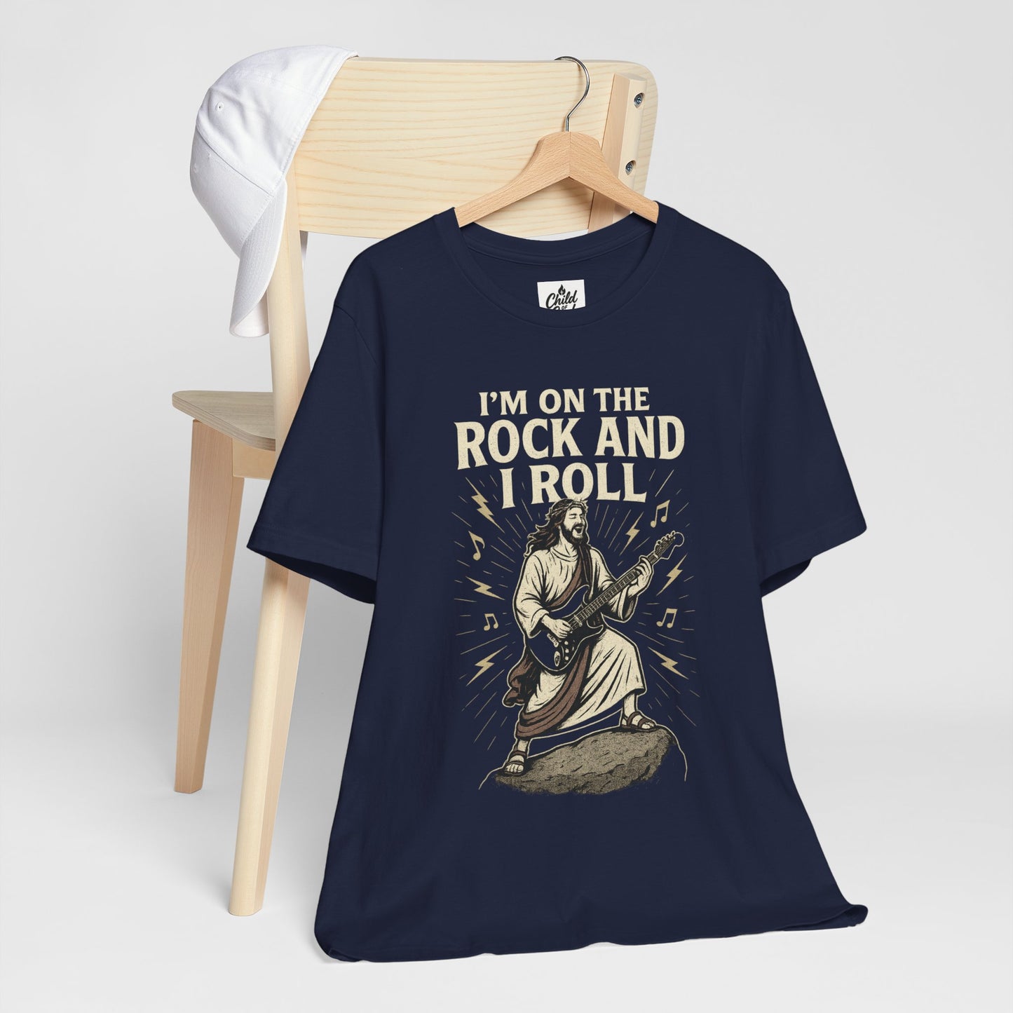 "I'm on the Rock and I Roll" . Unisex Jersey Short Sleeve Tee - Casual Christian Graphic Shirt for Positive Vibes