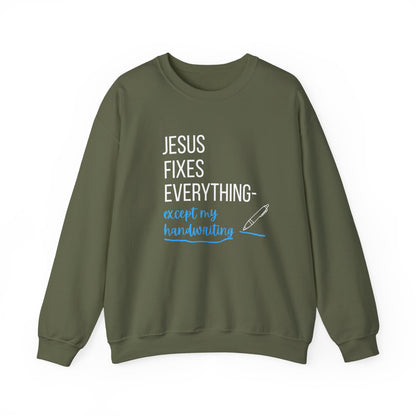 “Jesus Fixes Everything—Except My Handwriting” Religious Crewneck Sweatshirt – Fun & Faithful Style