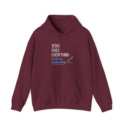 “Jesus Fixes Everything—Except My Handwriting” Hoodie – Unisex religious Pullover with a Fun Twist