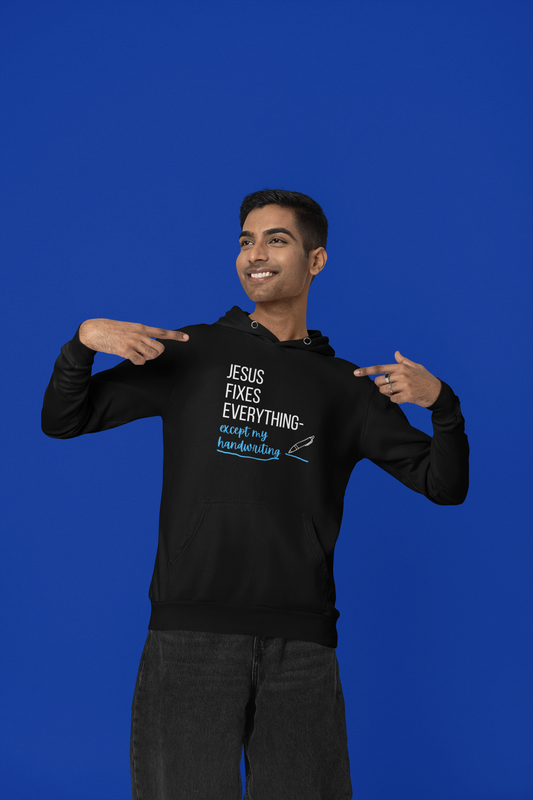 “Jesus Fixes Everything—Except My Handwriting” Hoodie – Unisex religious Pullover with a Fun Twist